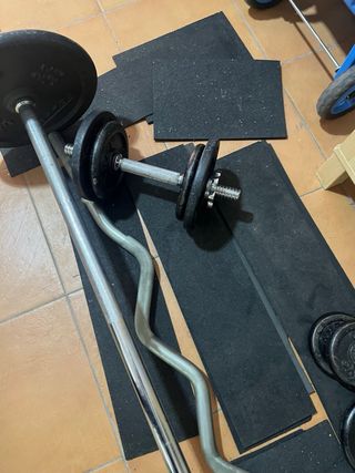 Juego de pesas y barra Algo negociable