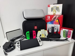 Consola Nintendo Switch OLED blanca + Accesorios !