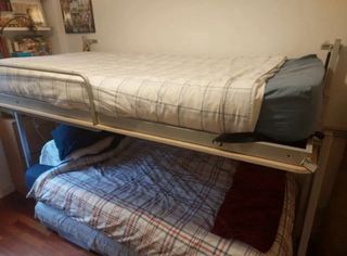 Cama alta abatible
