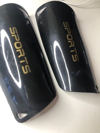 Espinilleres negras de football