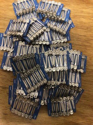 Sujeta Rizos Plateados