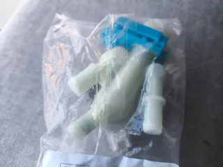 Electroválvula 3 salidas lavadora AEG 1325188405.