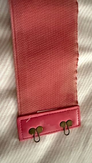 Cinturón rosa con flor