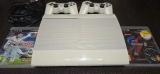 Playstation 3 Slim Blanca + 2 Juegos