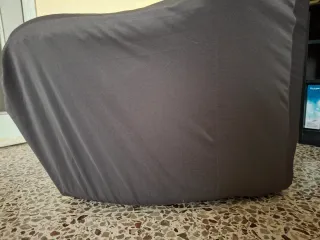 Copripoltrona elasticizzato grigio.