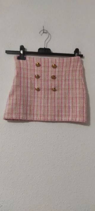 Conjunto chaqueta y falda rosa niña
