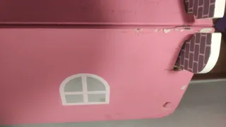 Casa de muñecas de madera