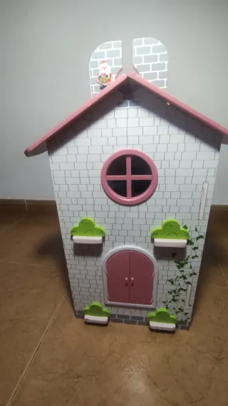 Casa de muñecas de madera