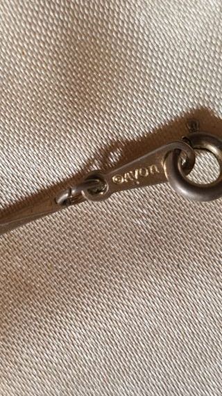 Collana Avon vintage dorata con elementi traforati