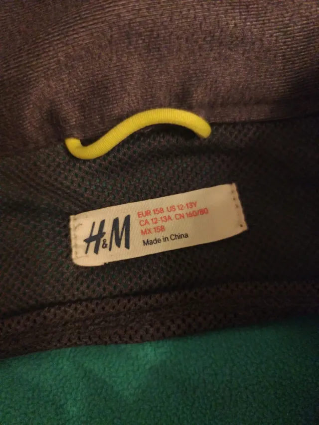 Chaqueta gris con cremallera verde Talla 158 (niñ@