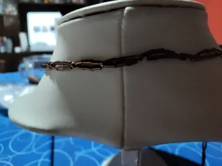 Collar con colgante de cobre y cuentas