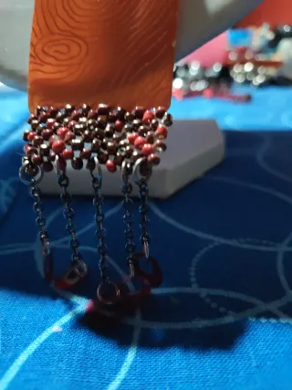 Collar con colgante de cobre y cuentas