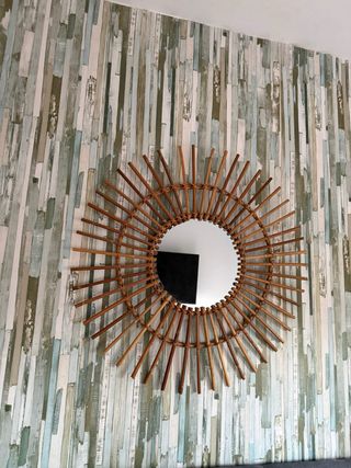 Specchio in bambù a forma di sole
