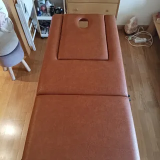 Camilla plegable ecopostural con funda.