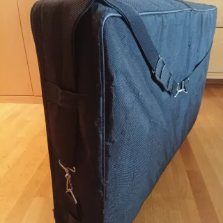 Camilla plegable ecopostural con funda.