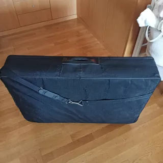 Camilla plegable ecopostural con funda.