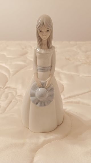Figura de porcelana mujer con sombrero