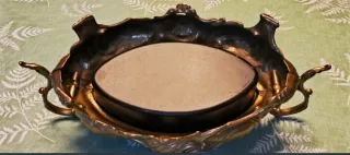 Centro decorativo antiguo con asas