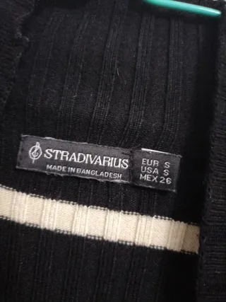 Jersey cuello alto rayas blanco y negro