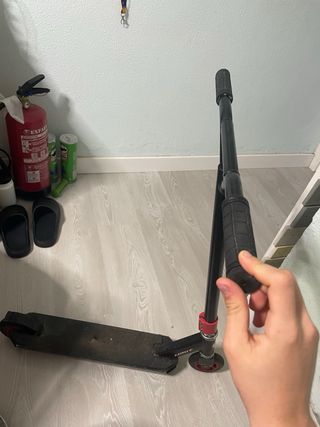 Patinete freestyle negro y rojo