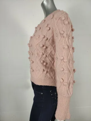 Pullover girocollo rosa con pomponcini