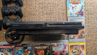 Consola PS3 Slim Negra + 6 Juegos