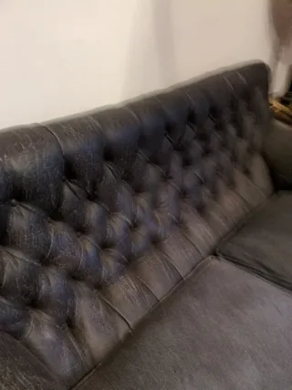 Sofá Chester tapizado tela y piel