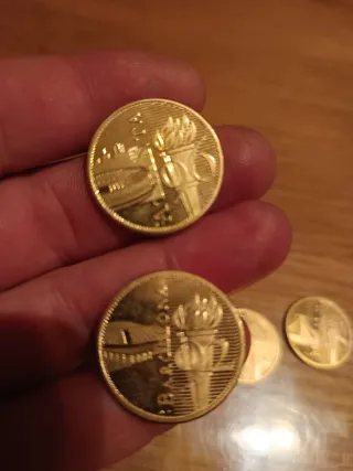 Medallas Juegos Olímpicos con baño de oro de 22 k