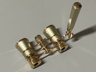 Mini binocolo da teatro 3x25 in metallo + manopola