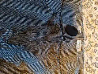 Pantalón pitillo cuadros negro y blanco