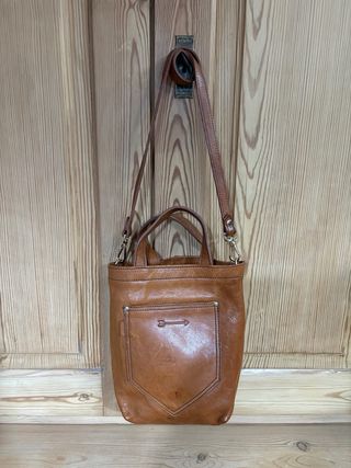 Bolso de piel marrón de mercules.