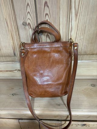 Bolso de piel marrón de mercules.