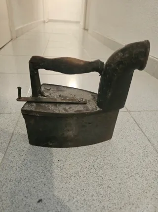 Plancha antigua de carbón