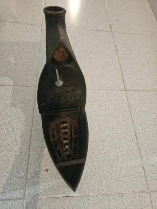 Plancha antigua de carbón