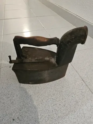 Plancha antigua de carbón