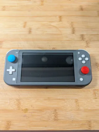 Nintendo Switch Lite Gris + Metroid Dread