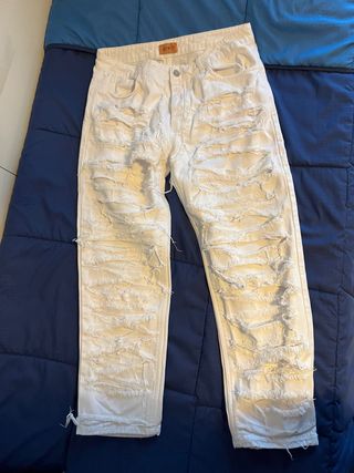 Jeans bianchi strappati