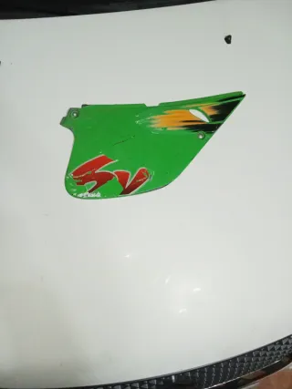 Tapa lateral Rieju RR trasera