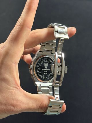 Reloj Poedagar Plata y Blanco