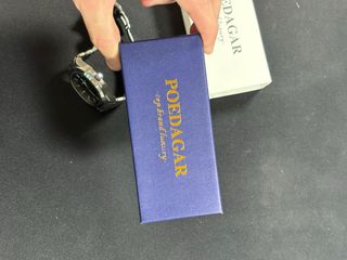 Reloj Poedagar Negro y Plateado