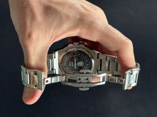 Reloj Poedagar Negro y Plateado