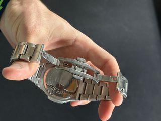 Reloj Poedagar Negro y Plateado