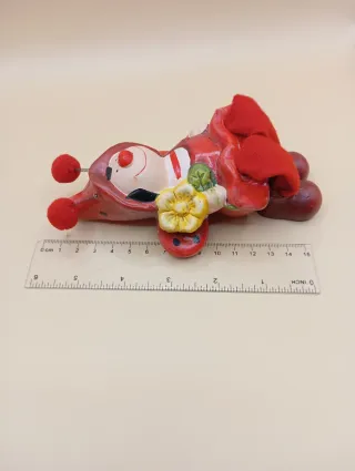 Soprammobile coccinella con fiore