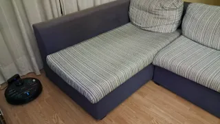 Sofá modular azul y gris.