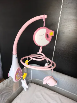 Carrusel musical Chicco rosa