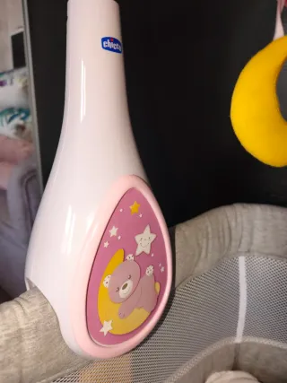 Carrusel musical Chicco rosa