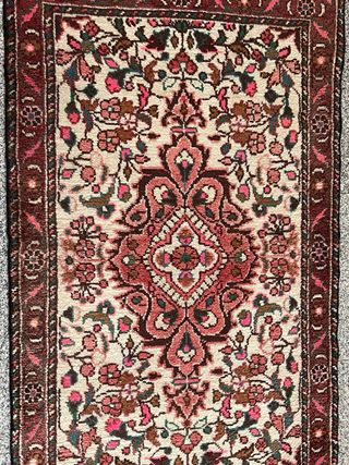 Alfombra antigua de lana