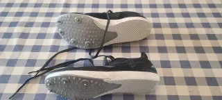 Zapatillas de clavos negras