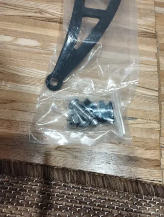 Soporte Escape Aprilia RSV4