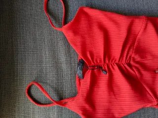 Mono rosa fuerte pantalón campana